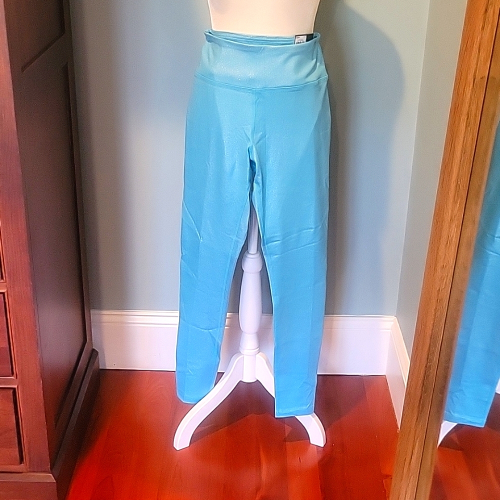 Women's Sparkly Turquoise leggings. Size Medium. Polyester and Spandex.